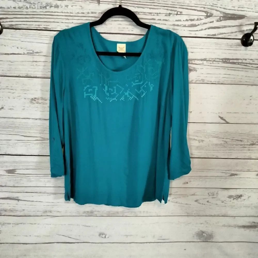 New Without tags. "Faded Glory" woman's blouse